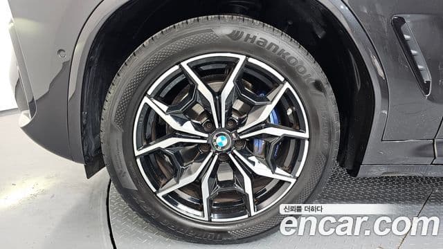 BMW X4 2023 — ფოტო 4/20