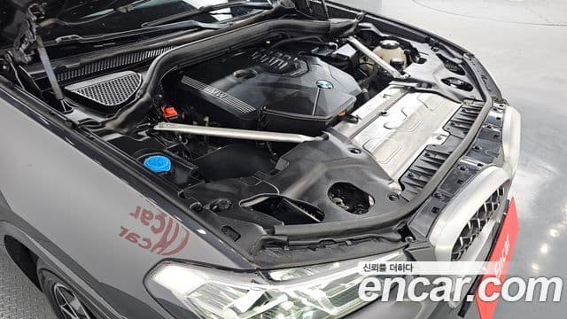BMW X4 2023 — ფოტო 5/20