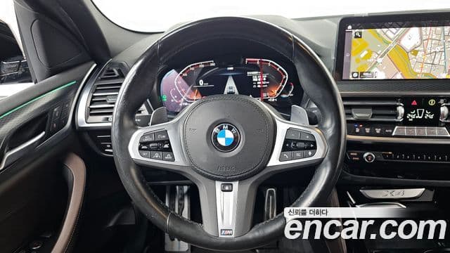 BMW X4 2023 — ფოტო 13/20