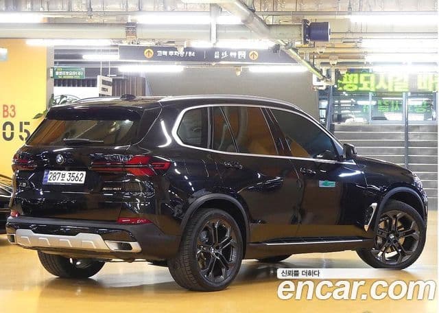 BMW X5 2024 — Фото 1/20