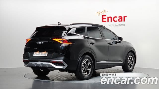 Kia Sportage 2023 — ფოტო 2/20