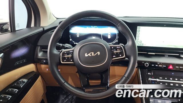 Kia Carnival 2023 — ფოტო 13/20