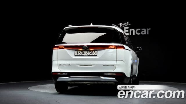 Kia Carnival 2021 — ფოტო 4/20