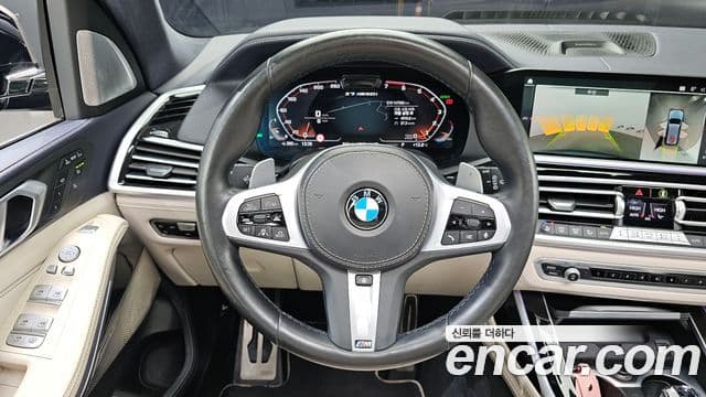 BMW X7 2021 — ფოტო 13/20