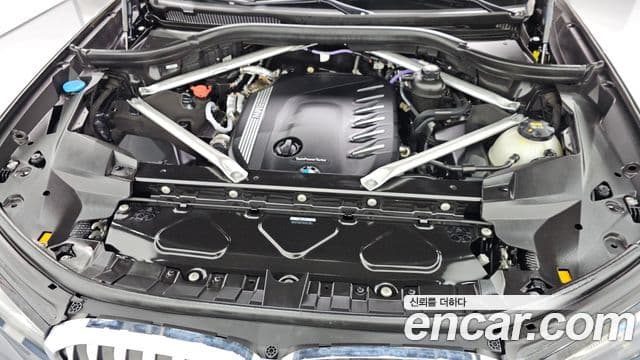 BMW X7 2022 — ფოტო 6/20