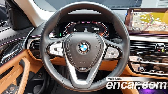 BMW 5 Series 2023 — Фото 12/20