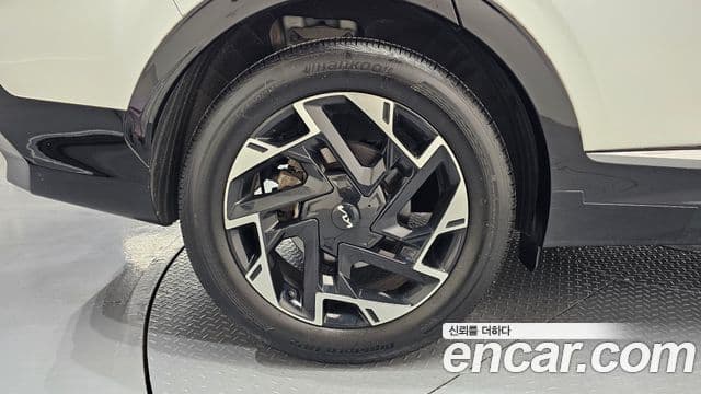 Kia Sportage 2021 — ფოტო 5/20