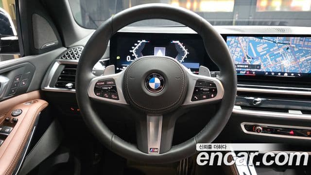 BMW X5 2025 — ფოტო 13/20