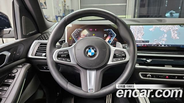 BMW X5 2025 — ფოტო 13/20