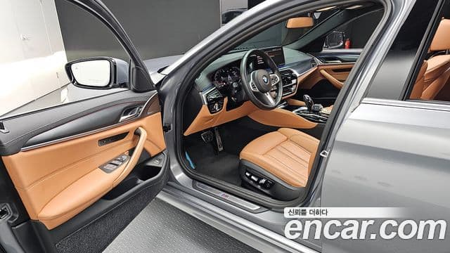 BMW 5 Series 2022 — Фото 10/20