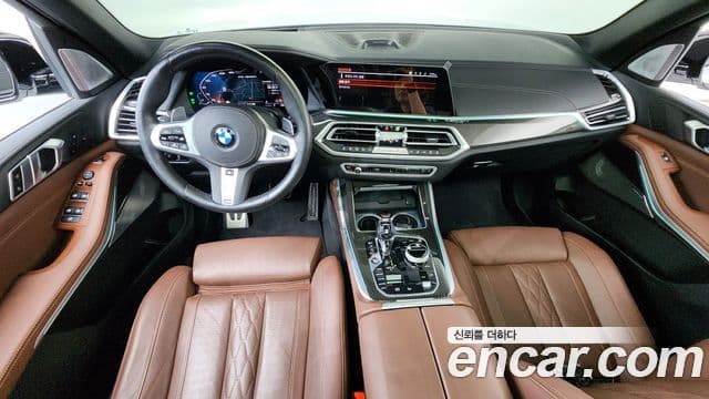 BMW X5 2022 — ფოტო 7/20