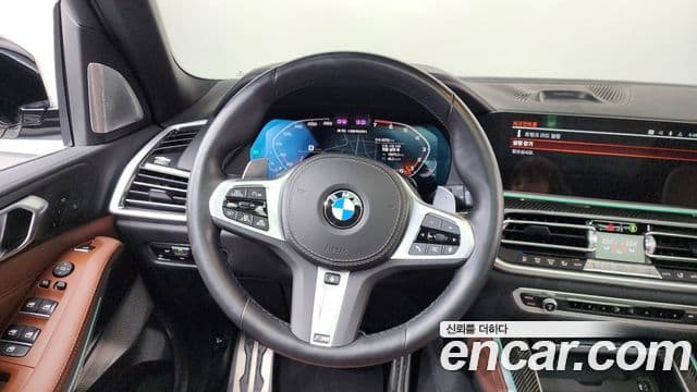 BMW X5 2022 — ფოტო 13/20
