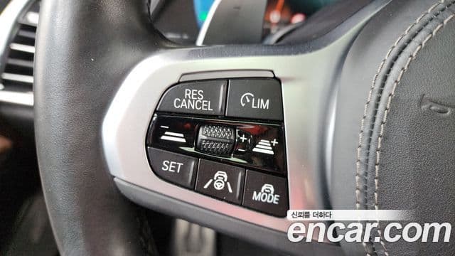 BMW X5 2022 — ფოტო 15/20
