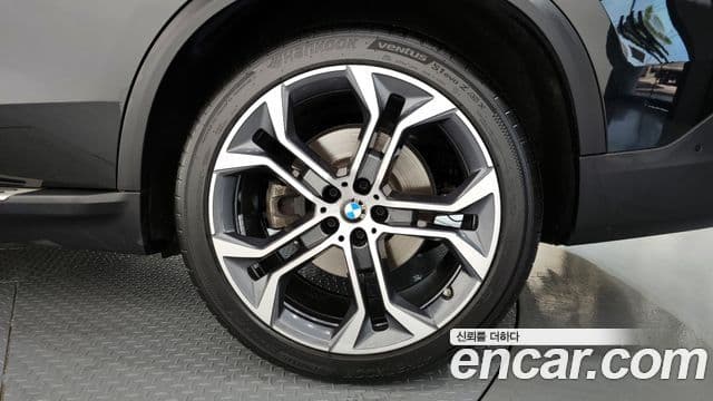 BMW X5 2023 — ფოტო 24/30