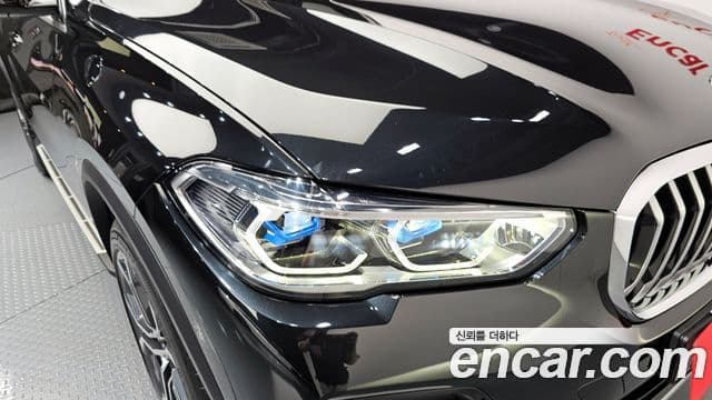 BMW X5 2023 — ფოტო 9/30