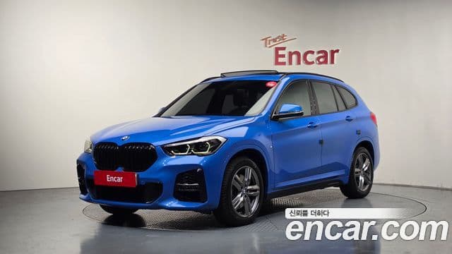 BMW X1 2021 — Фото 1/20