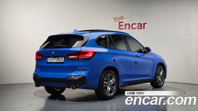 BMW X1 2021 — Фото 2/20