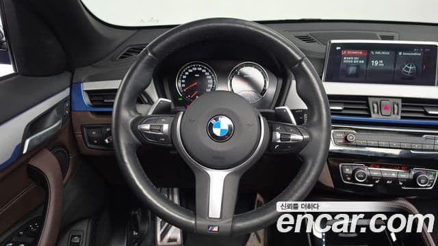 BMW X1 2021 — Фото 12/20