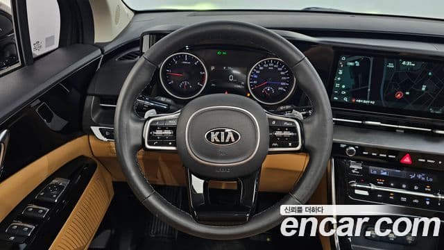 Kia Carnival 2021 — ფოტო 13/20