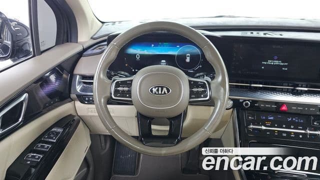 Kia Carnival 2021 — ფოტო 13/20