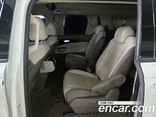 Kia Carnival 2023 — Фото 8/19