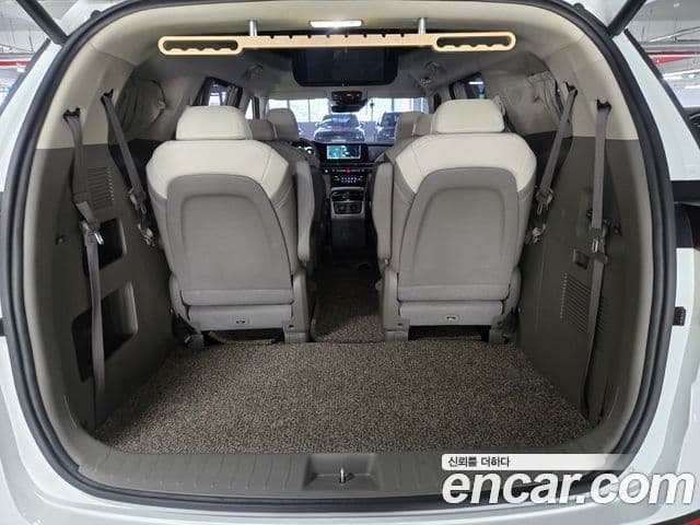 Kia Carnival 2023 — Фото 18/19