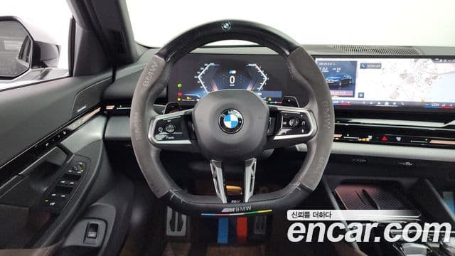BMW 5 Series 2024 — ფოტო 14/20