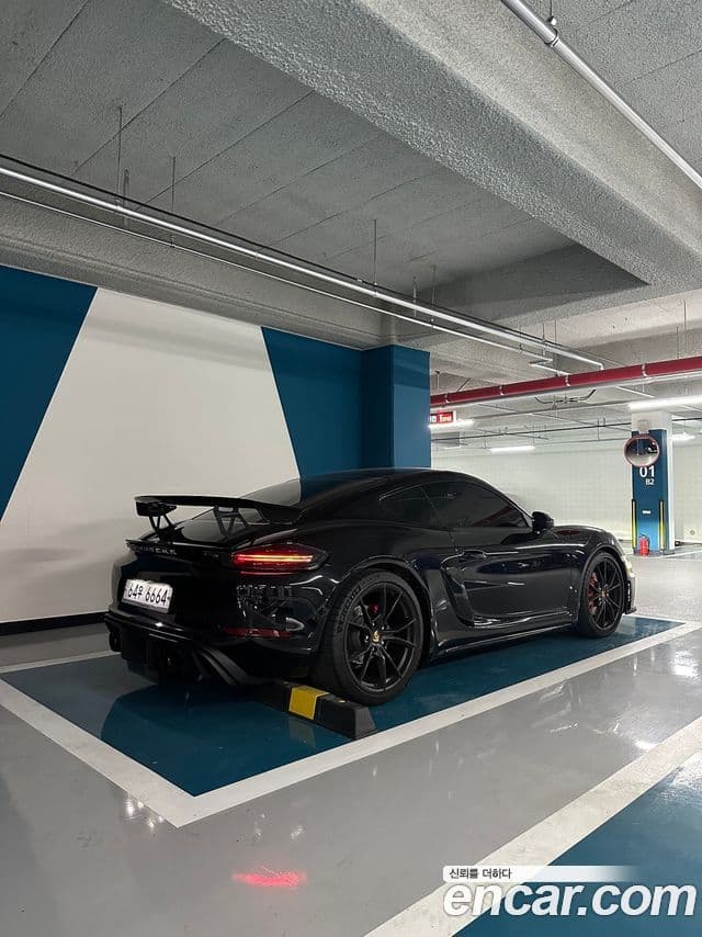 Porsche 718 Cayman 2019 — Фото 11/20