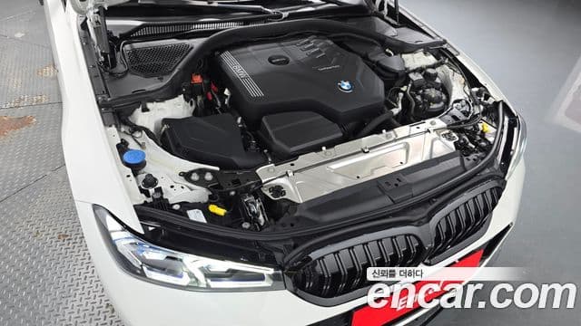 BMW 3 Series 2023 — ფოტო 6/20