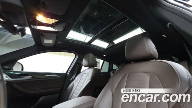BMW X4 2024 — ფოტო 18/20
