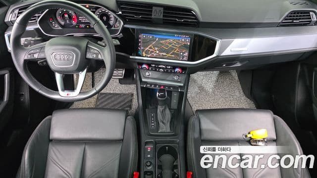 Audi Q3 2023 — ფოტო 23/32