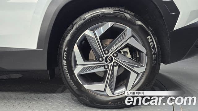 Hyundai Tucson Hybrid 2021 — Photo 12/30