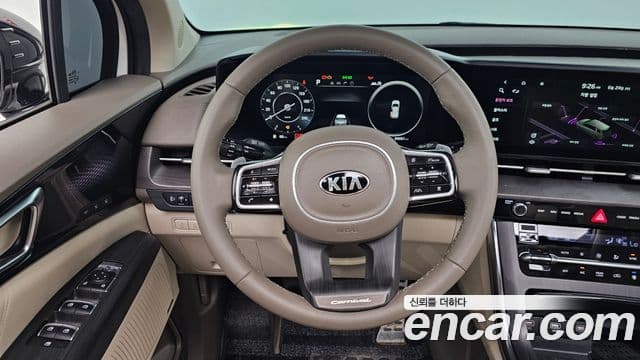 Kia Carnival 2021 — ფოტო 13/20