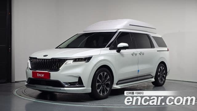 Kia Carnival 2021 — ფოტო 1/20