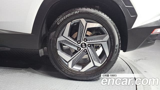 Hyundai Tucson Hybrid 2021 — ფოტო 3/30