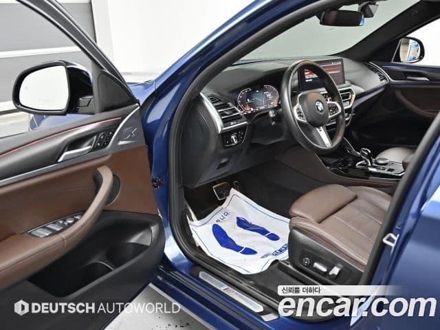 BMW X4 2023 — Фото 11/20
