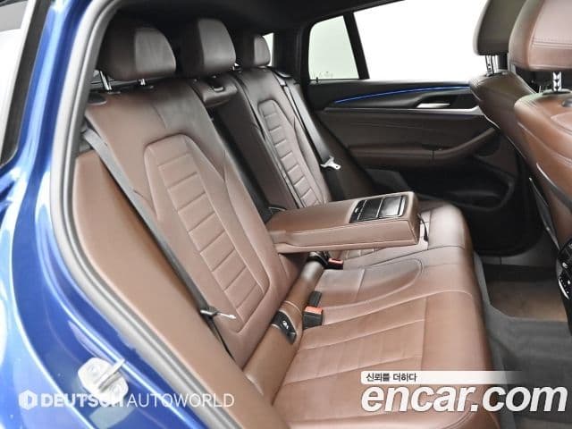 BMW X4 2023 — Фото 12/20