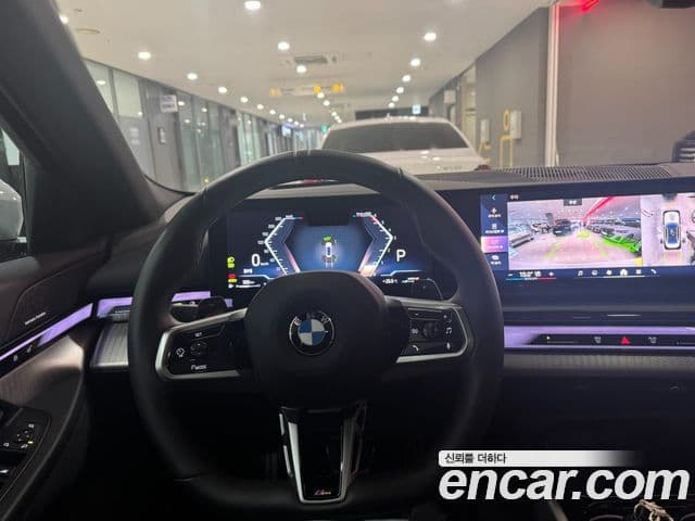 BMW 5 Series 2024 — ფოტო 14/19