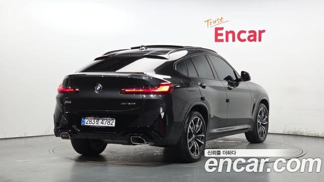 BMW X4 2025 — Фото 1/20