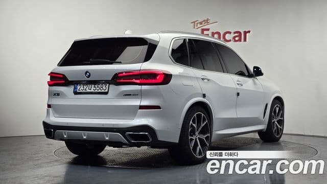 BMW X5 2022 — Фото 1/20