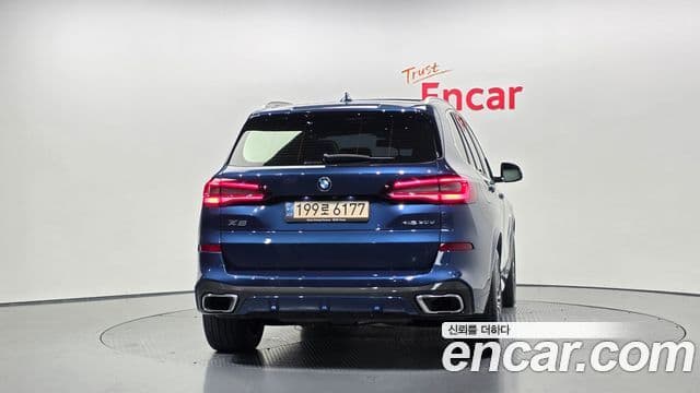 BMW X5 2021 — ფოტო 4/20
