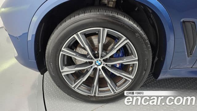 BMW X5 2021 — ფოტო 5/20