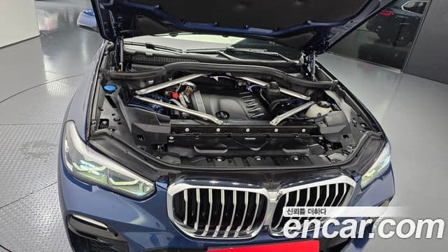 BMW X5 2021 — ფოტო 6/20