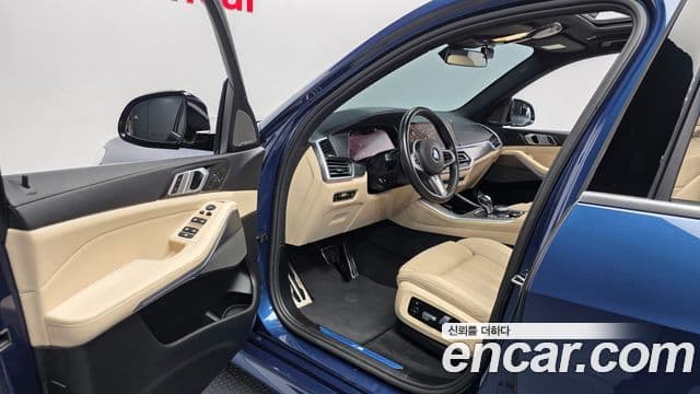 BMW X5 2021 — ფოტო 10/20