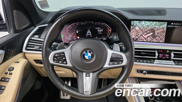 BMW X5 2021 — ფოტო 13/20