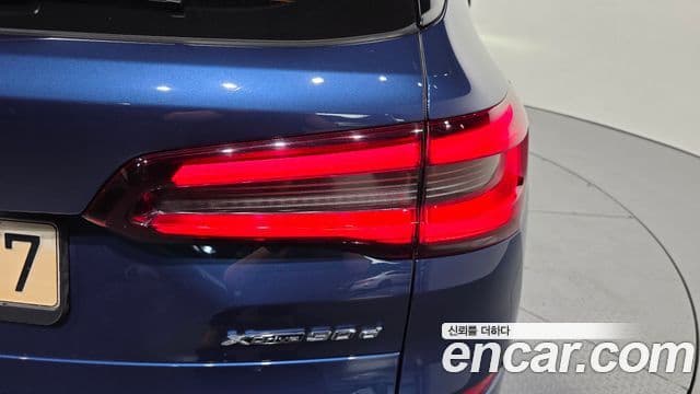 BMW X5 2021 — ფოტო 32/34