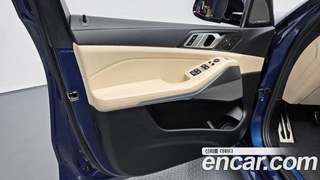 BMW X5 2021 — ფოტო 28/34