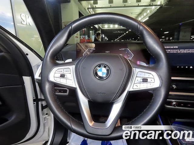 BMW X7 2023 — ფოტო 6/20
