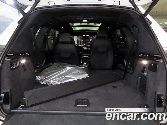 BMW X7 2023 — ფოტო 15/20