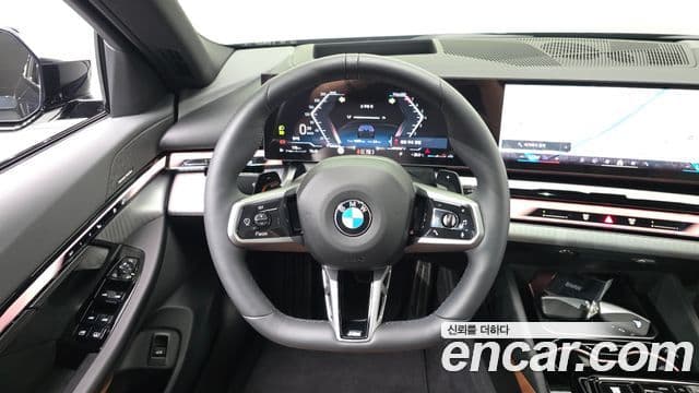 BMW 5 Series 2025 — ფოტო 14/20